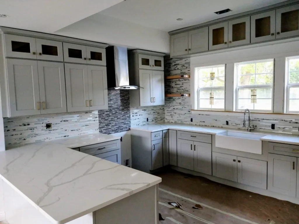 Contemporary kitchen with grey cabinets and island — custom kitchen remodel in Indianapolis, Indiana by Romero Design